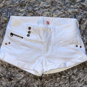 25 White Jean Shorts G by Guess 2” inseam low waisted unique. EUC